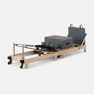 Reformer Pilates pliant en chêne massif – studio professionnel