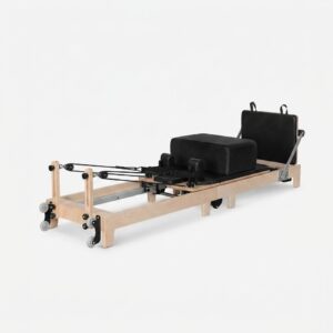 Reformer Pilates pliant en érable massif – studio professionnel