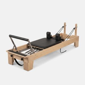 Reformer Pilates en chêne massif pour studio professionnel