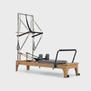Reformer Pilates bois blanc avec tour intégrée – studio professionnel